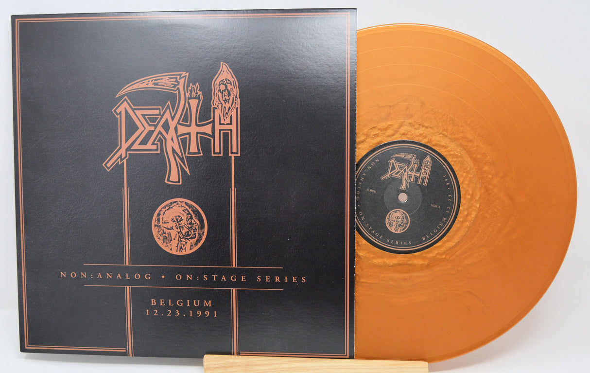 Front cover and orange vinyl record of Death 'Non Analog: On Stage Series, Belgium 1991' LP