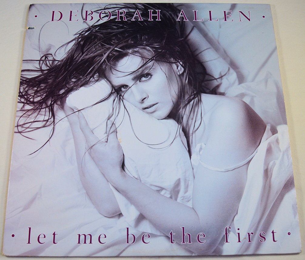 Deborah Allen Let Me Be The First 1984 album cover with artist posing on a bed