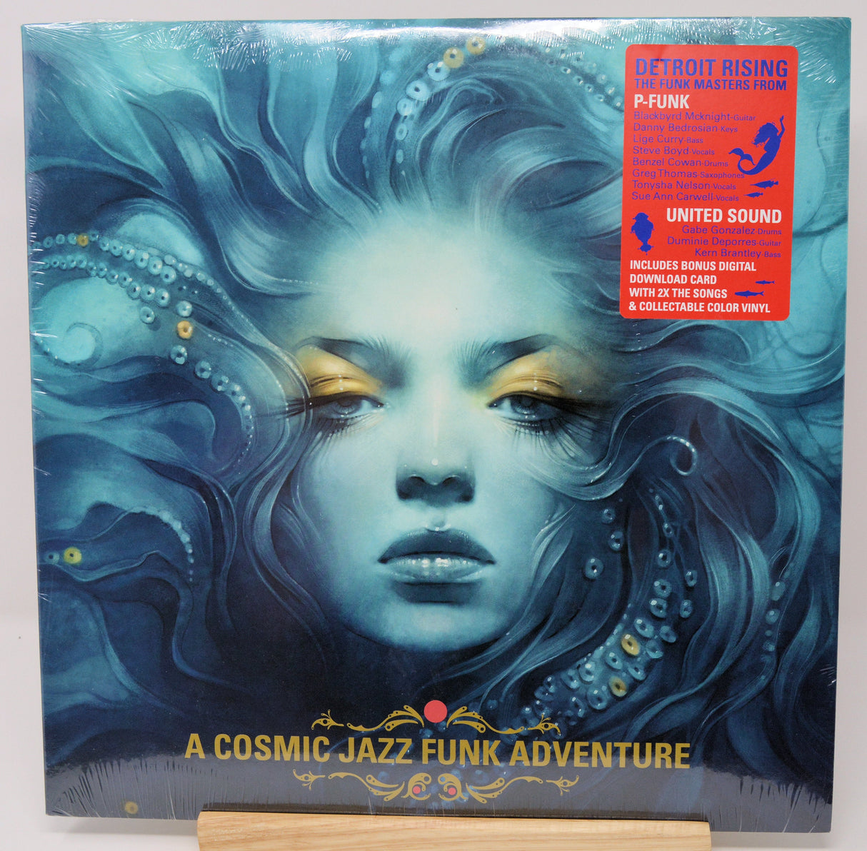 Front cover of Detroit Rising: A Cosmic Jazz Funk Adventure vinyl featuring a cosmic mermaid with flowing hair