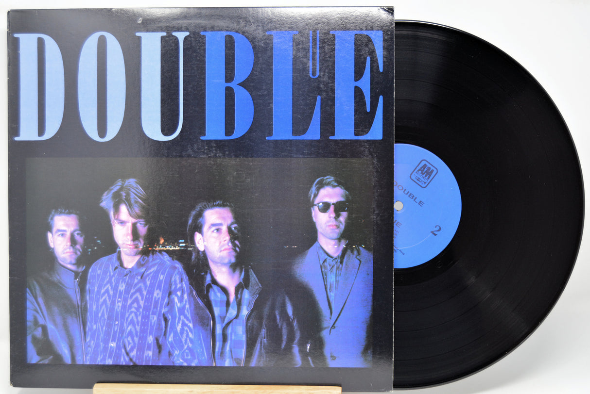 'Double Blue' Vinyl record with cover featuring a black and white photo of a the band and text.