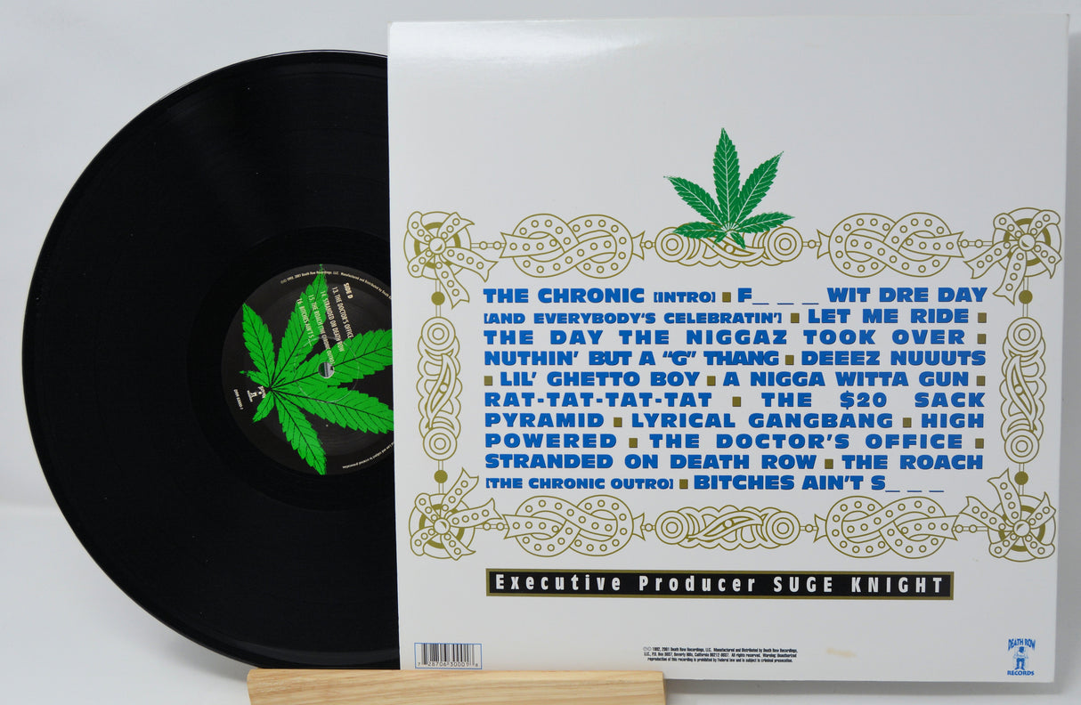 Vinyl record with a detailed cover featuring text and a cannabis leaf design.