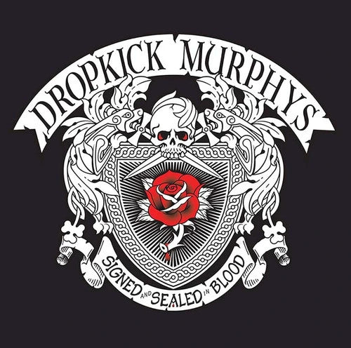 A graphic design featuring a white ornate crest with a skull, red rose, and decorative scrollwork, with the text 'DROPKICK MURPHYS' at the top and 'SIGNED AND SEALED IN BLOOD' at the bottom, shown on a dark background.