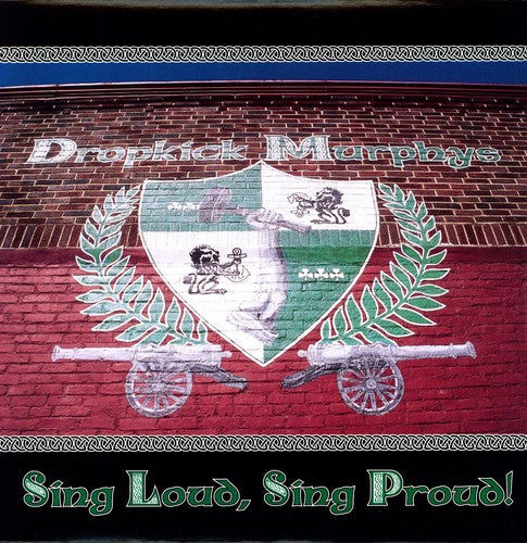 Brick wall with Dropkick Murphys logo and text 'Sing Loud, Sing Proud!'
