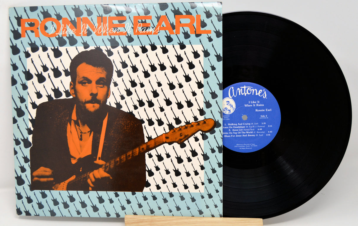 Vinyl record with cover featuring a person playing guitar and text 'Ronnie Earl'.