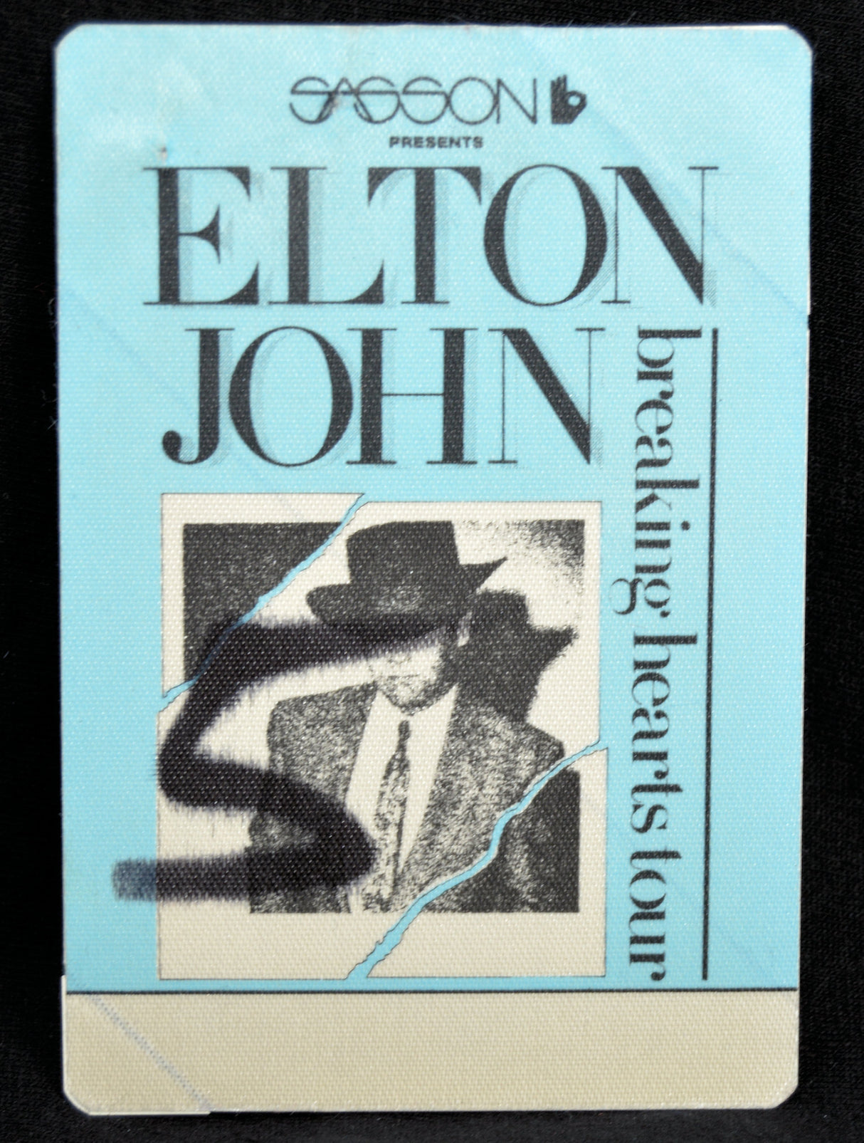 Elton John concert ticket stub with a blue border and black text.