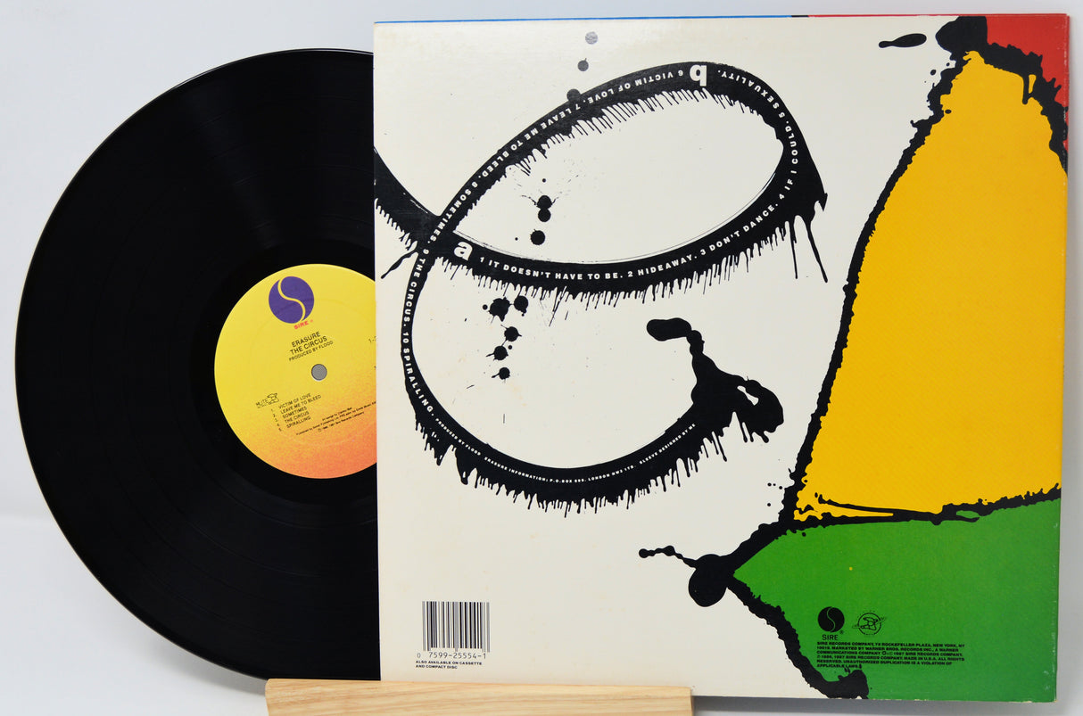 Vinyl record with a colorful cover featuring abstract art