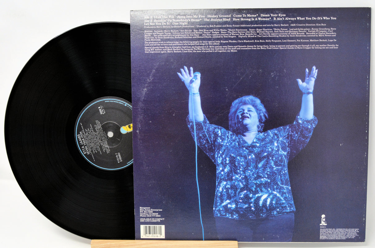 Vinyl record with a person on the cover and text on the back