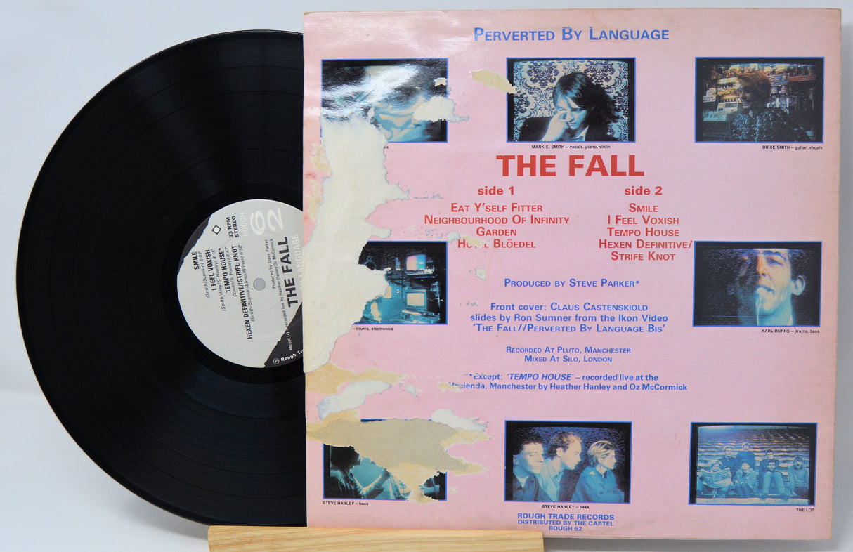 Vinyl record with cover featuring abstract images and text