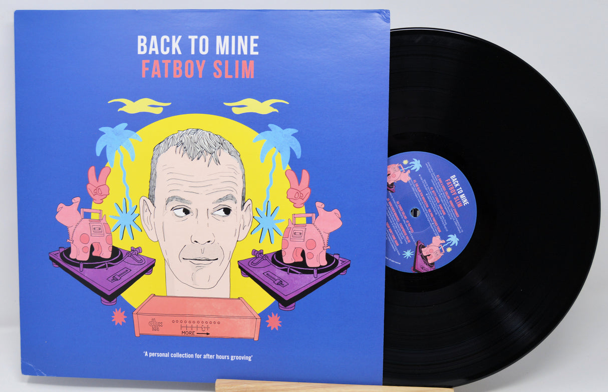Vinyl record with blue cover featuring a colorful illustration and 'Back to Mine' text, by Fatboy Slim.