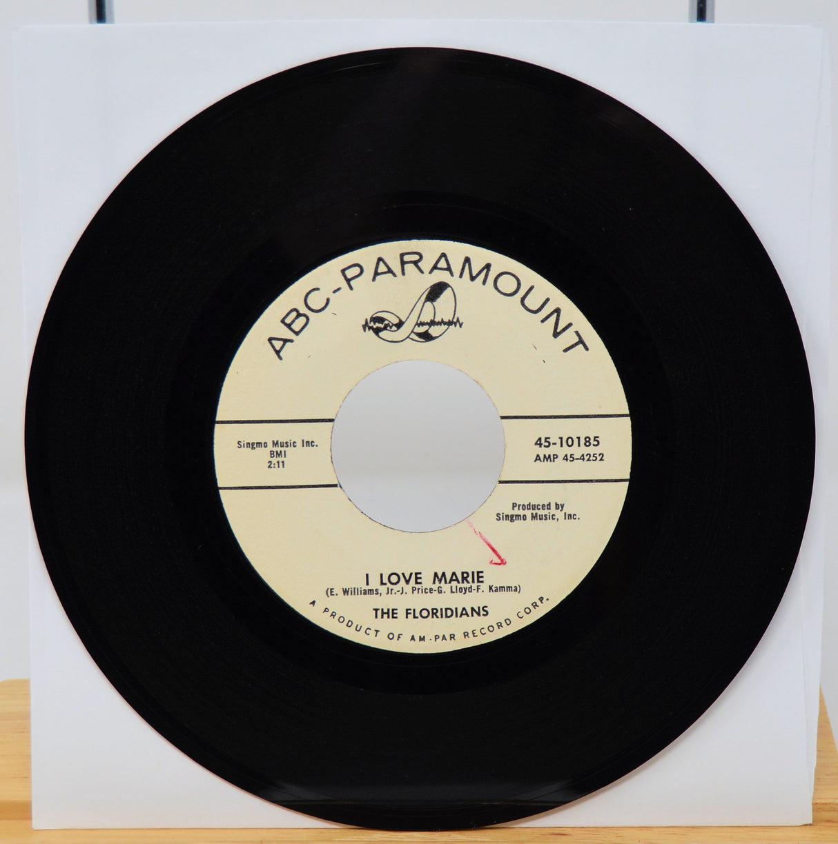 Vinyl record with ABC Paramount label on a white background
