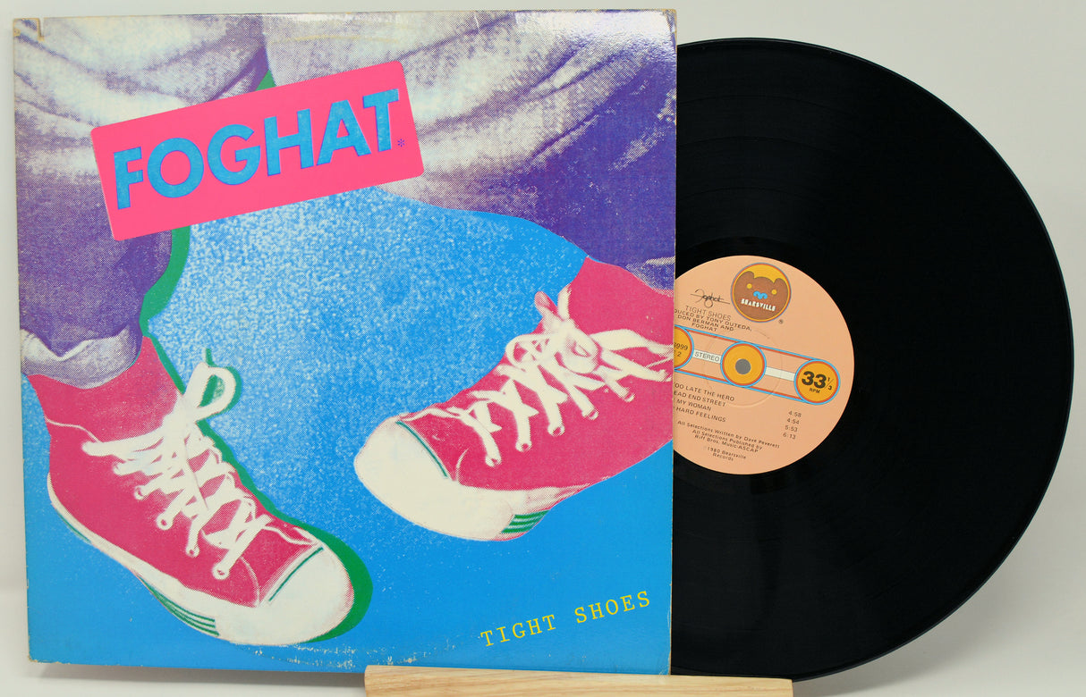 Vinyl record with a colorful cover featuring pink sneakers and the word 'FOGHA', on a white background.