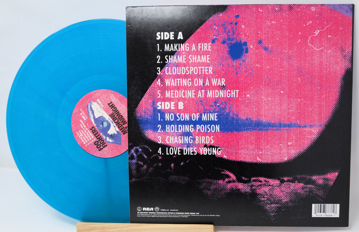 Vinyl cover featuring colorful blue and red artwork for Foo Fighters Medicine At Midnight