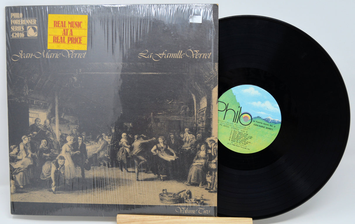 Jean-Marie Verret La Famille Verret Volume 2 vinyl record and front cover showing vintage Quebec folk dance illustration
