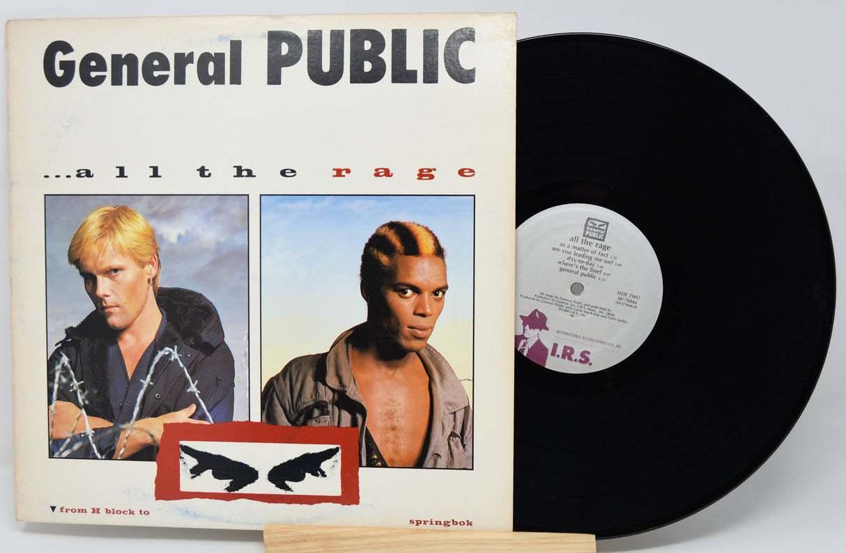 Vinyl record and cover with 'General Public' album art on a white background