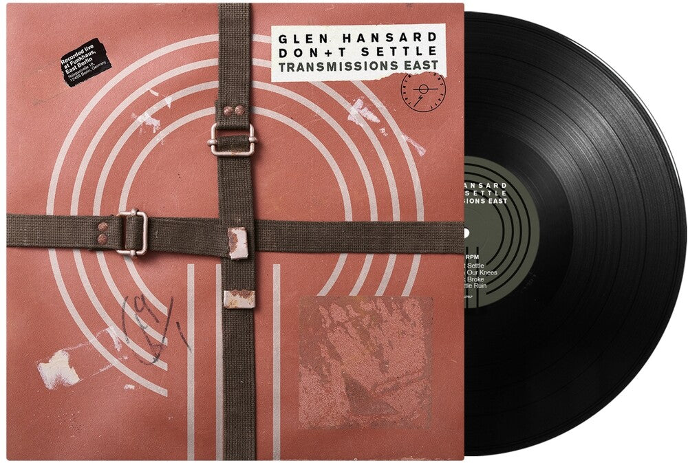 Vinyl record with a brown sleeve featuring text and design elements.