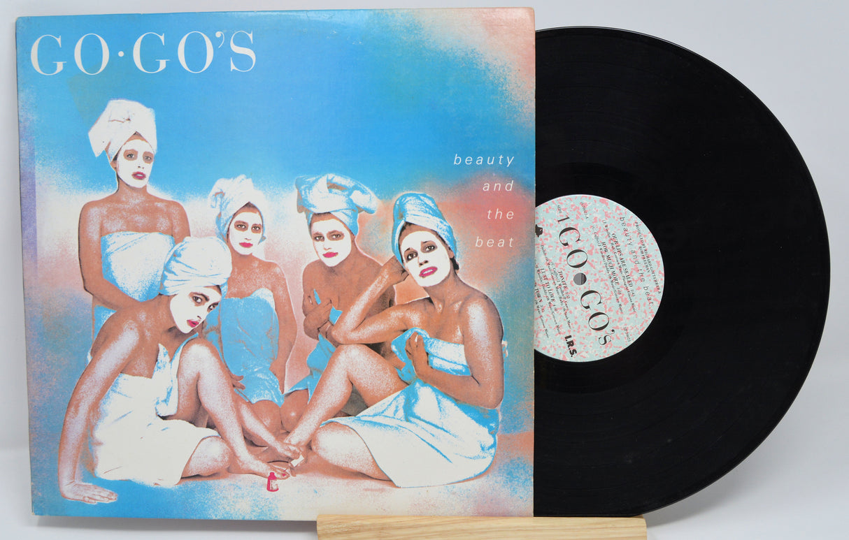 Vinyl record with cover featuring 'GO-Go's' and album art of women in towels.