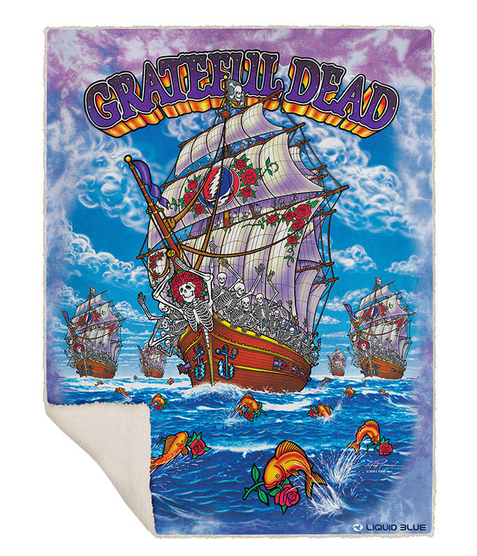 Grateful Dead blanket with ship and colorful design on a blue and purple background