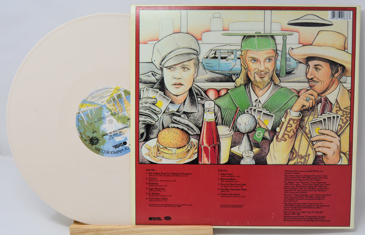 Vinyl record with a colorful cover featuring illustrations of people and objects.