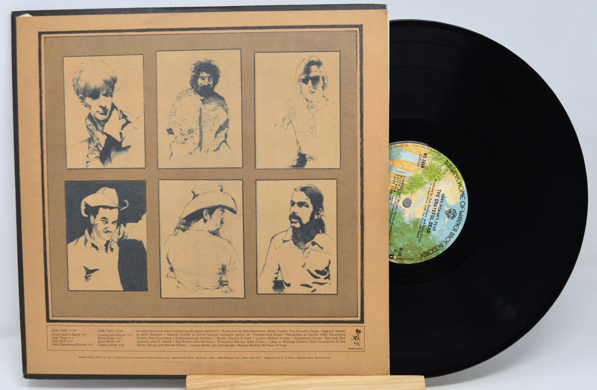 Vinyl record with a cover featuring portraits of a person on a beige background