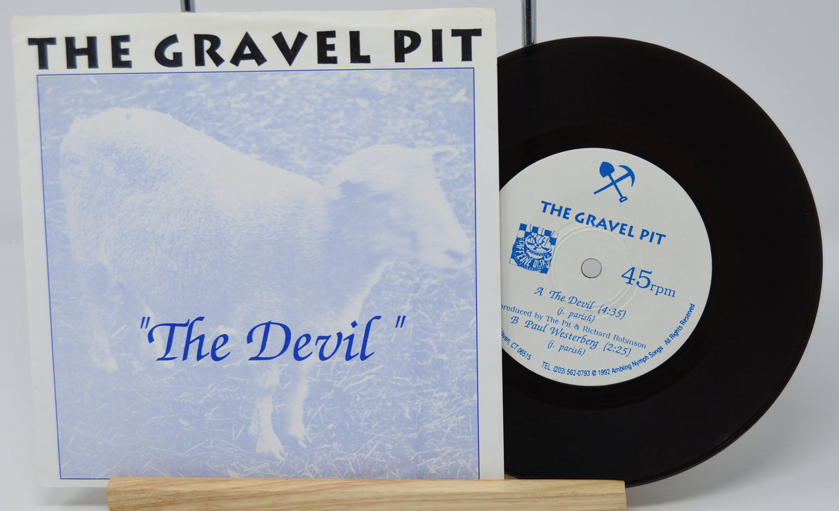 Vinyl record and cover titled 'The Devil' by The Gravel Pit on a white background