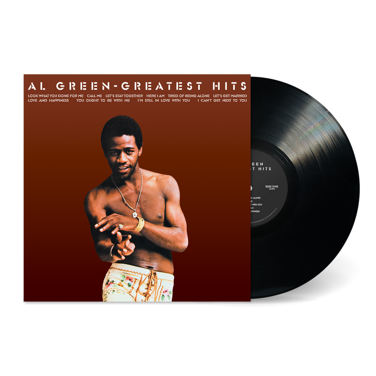 Vinyl record with Al Green's 'Greatest Hits' on a white background