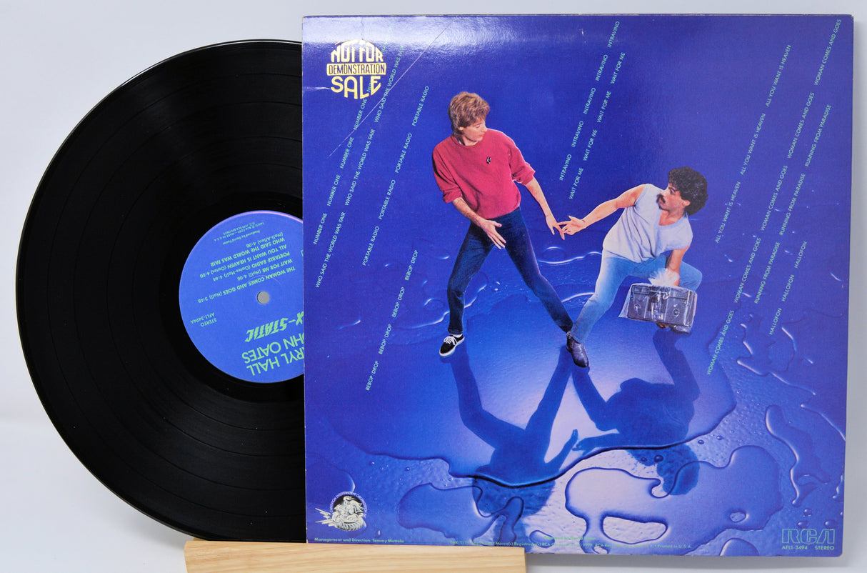 Vinyl record with a blue back cover featuring a boom box and 'Daryl Hall & John Oates' X-Static text.