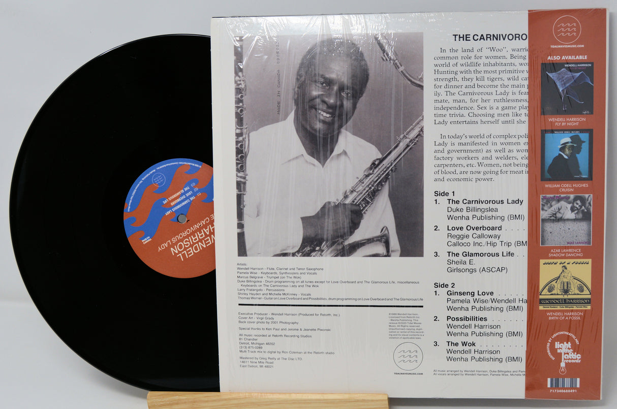 Vinyl record with cover featuring a black and white photo of a person playing a saxophone.