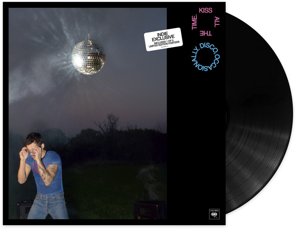 Vinyl record with a disco ball and person in a blue shirt against a dark sky.