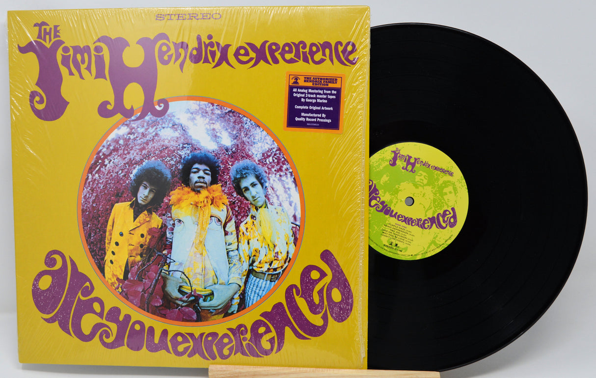 Vinyl record with 'The Jimi Hendrix Experience' album cover on a white background