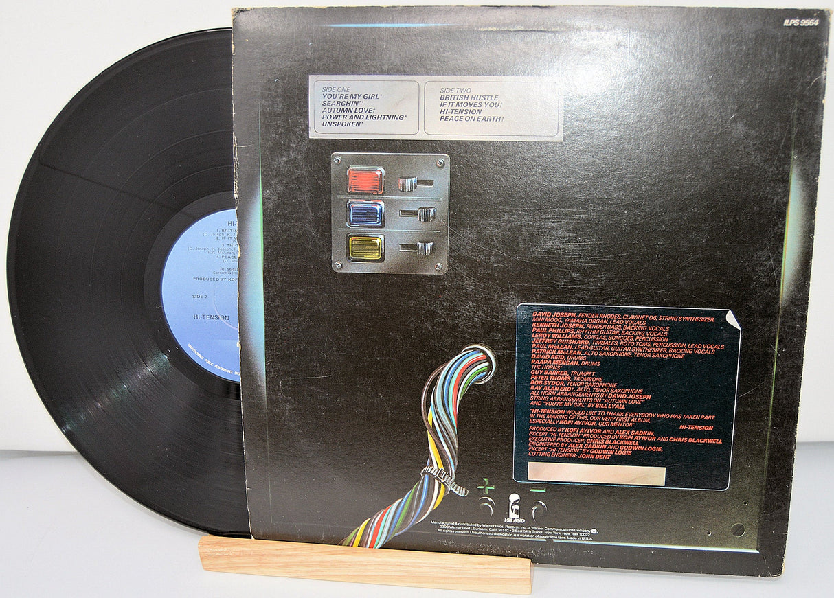 Back cover of Hi-Tension vinyl LP showing tracklist, production credits, and tech-inspired artwork