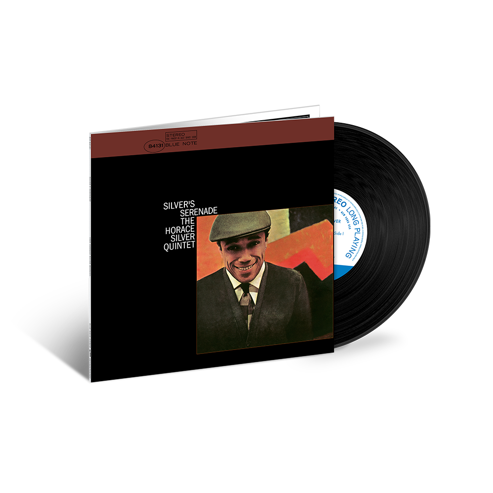 Vinyl record and cover with a man's portrait on a black background