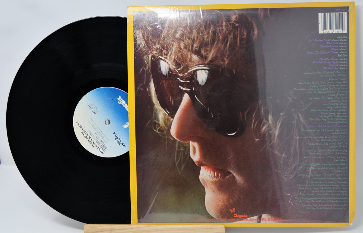 Vinyl record with cover featuring a close-up of a person's face.