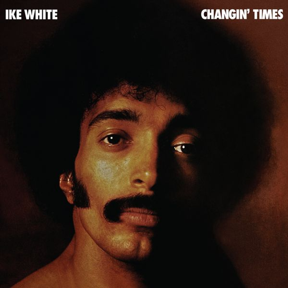 Album cover with a person's face and text 'Ike White Changin' Times'