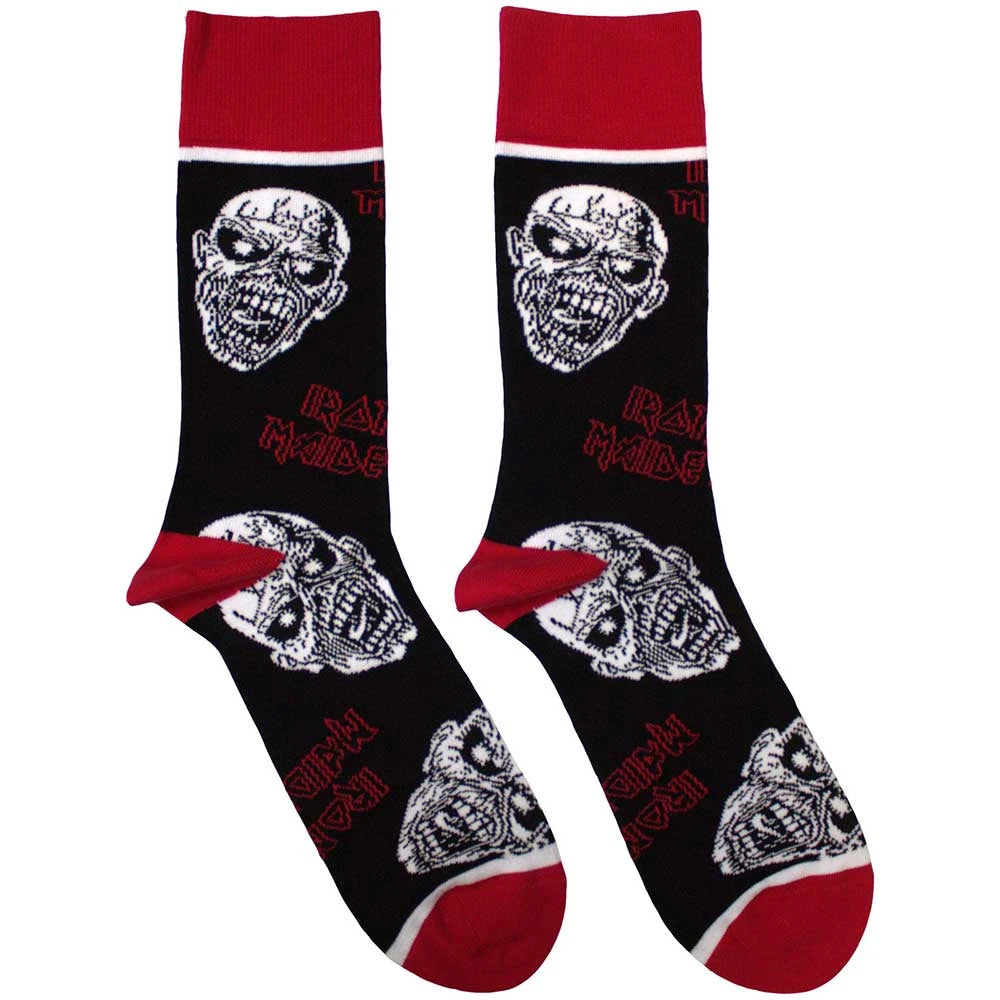 Pair of socks with skull design and red accents on a white background