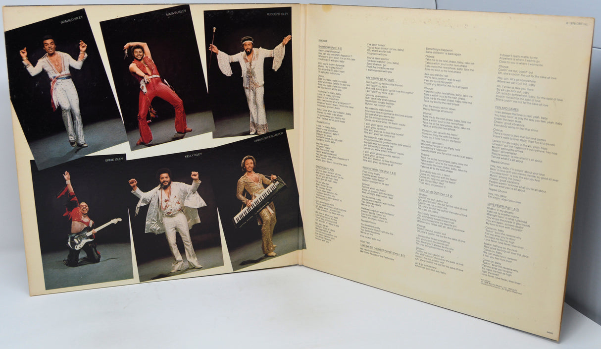 Vinyl record with cover featuring a performer in various poses and a list of songs.