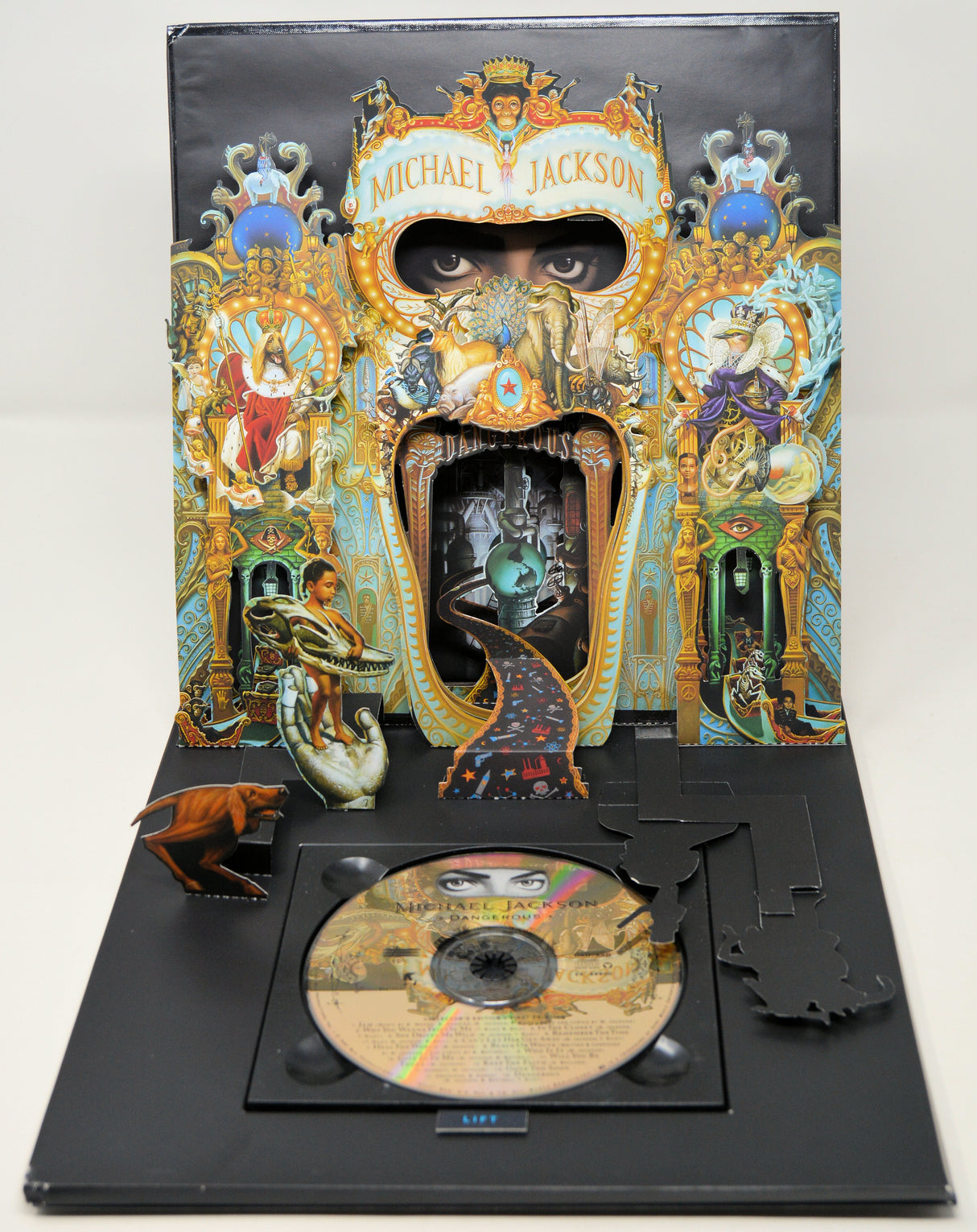 Michael Jackson album cover with intricate design and a CD inside