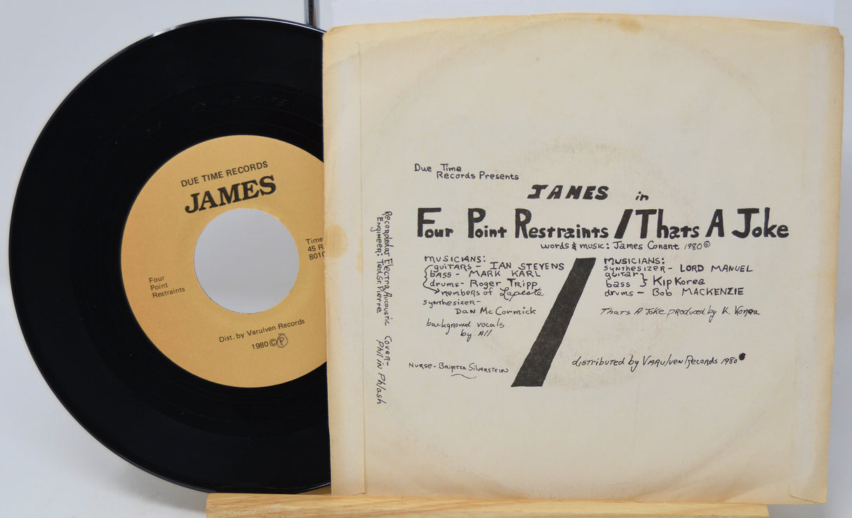 Vinyl record with a yellow label and its cover displaying text.
