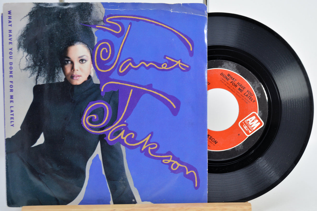 Janet Jackson 'What Have You Done For Me Lately' Vinyl record with a cover featuring her on the sleeve.