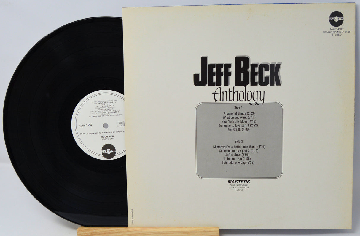 Vinyl record and cover of 'Jeff Beck Anthology' on a light gray background