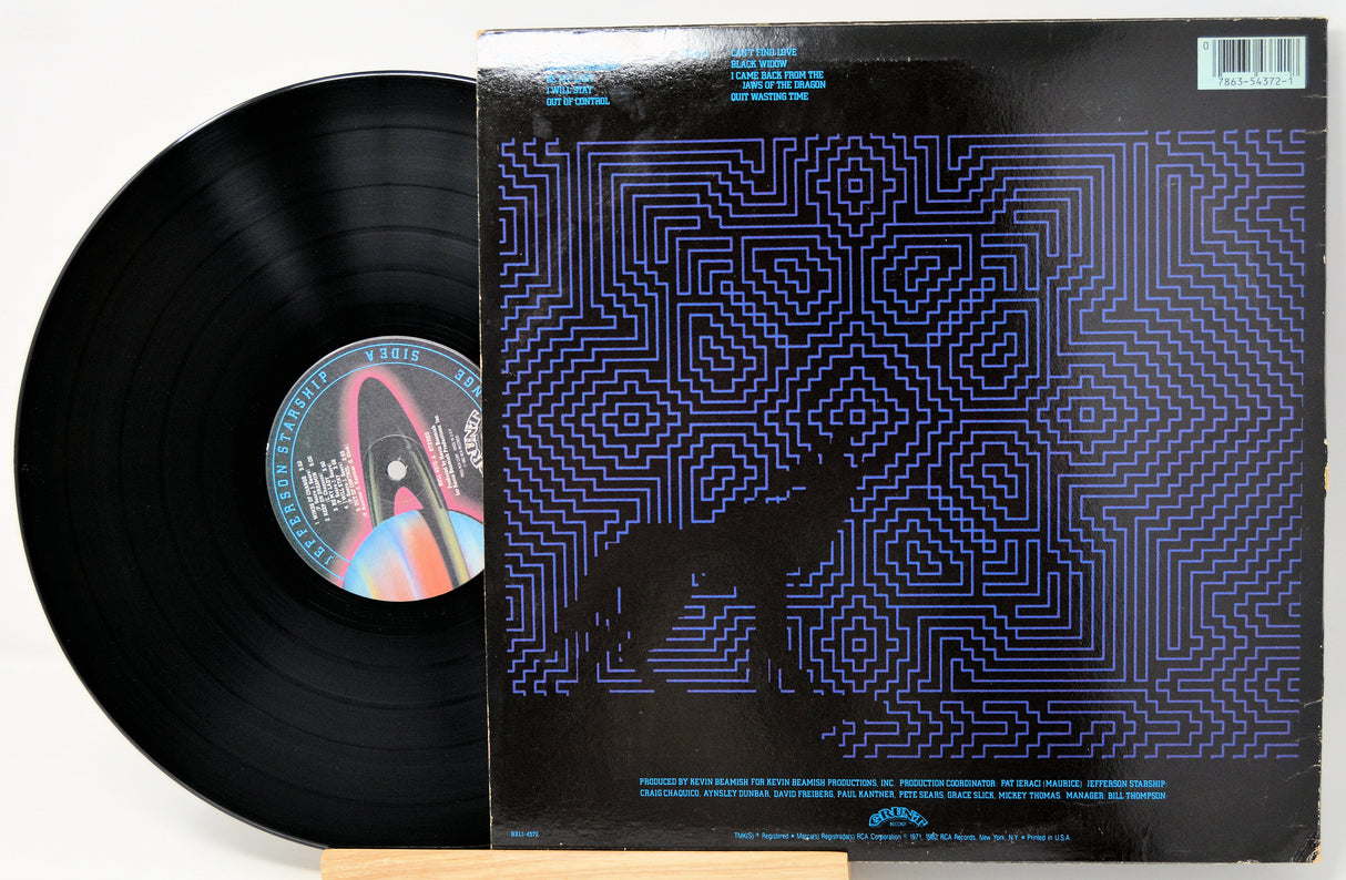 Vinyl record with a detailed cover featuring a maze design.