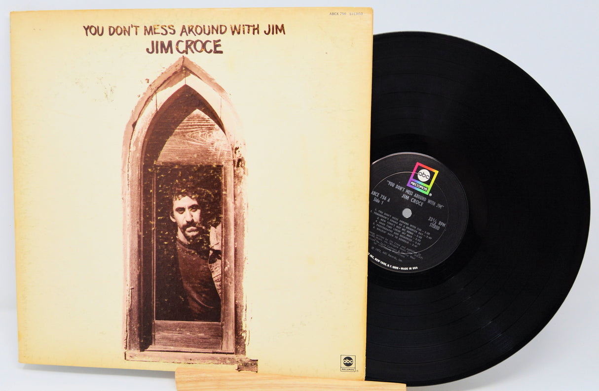 Vinyl record with cover featuring a portrait and text 'You Don't Mess Around with Jim' by Jim Croce.