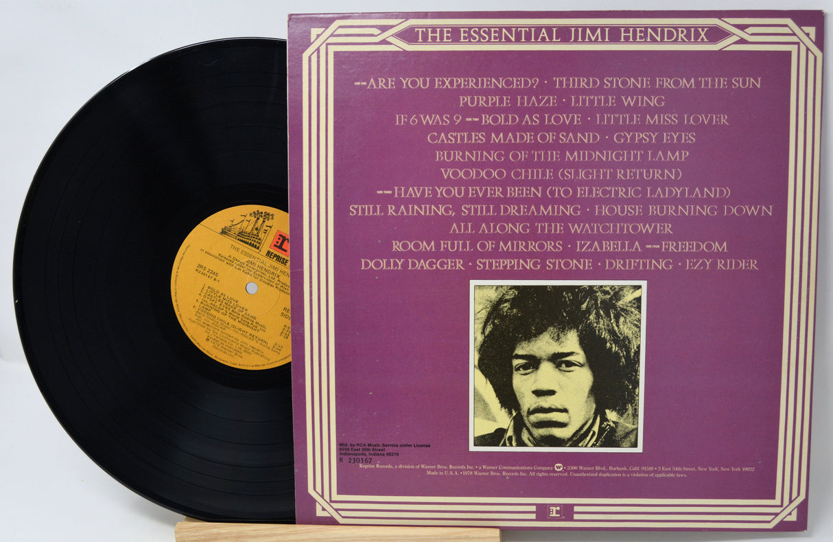 Vinyl record with a colorful cover featuring a group of women and a lipstick.