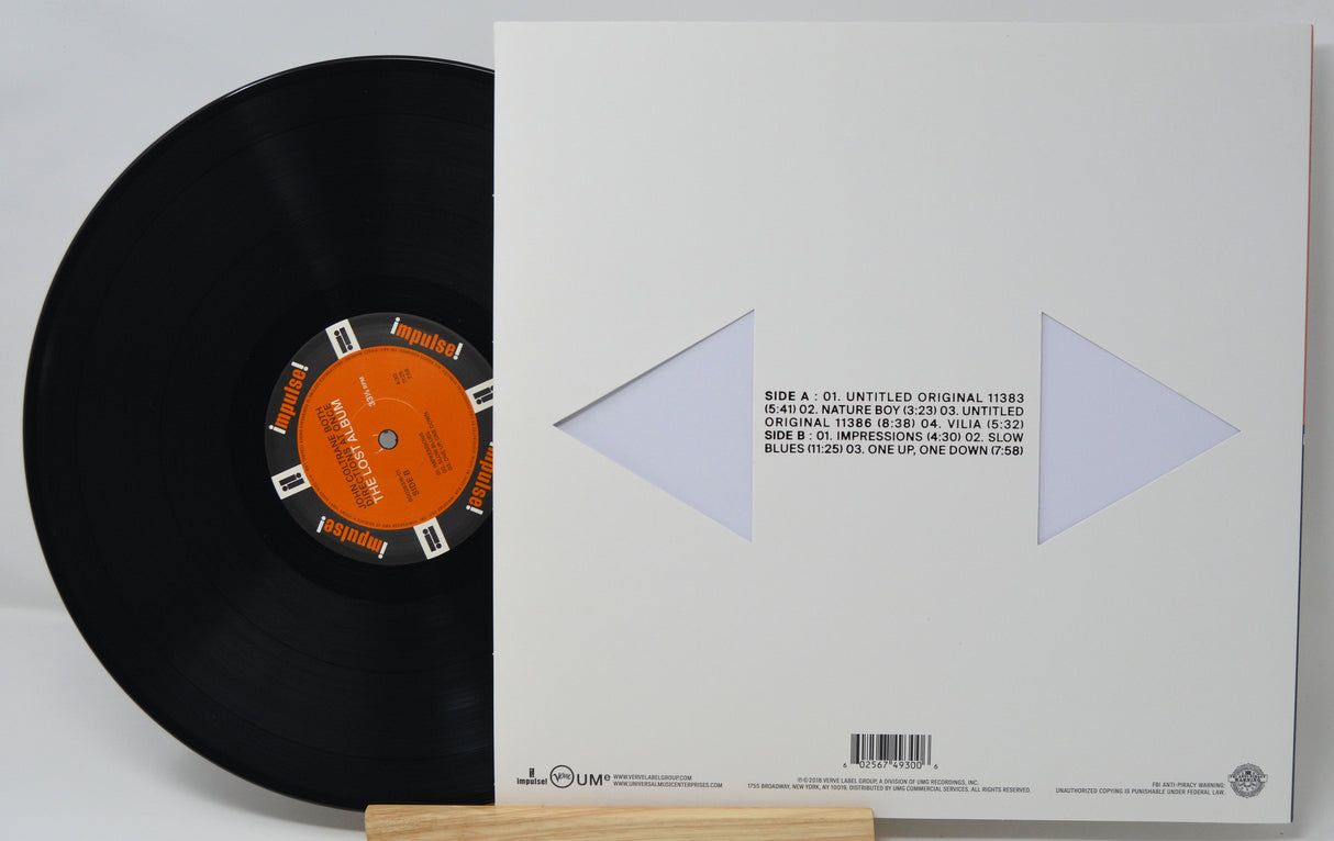 Back cover and vinyl record of John Coltrane Both Directions At Once The Lost Album showing tracklist