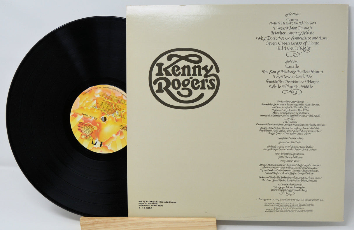 Back cover and vinyl record of Kenny Rogers album showing tracklist and production credits