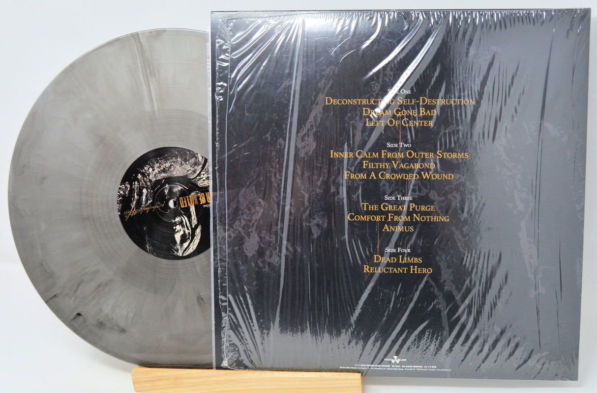 Back cover and silver & black swirl vinyl of Killer Be Killed Reluctant Hero LP highlighting tracklist