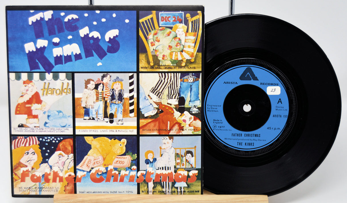 Vinyl record with cover featuring 'The Kinks' and 'Father Christmas' on a white background