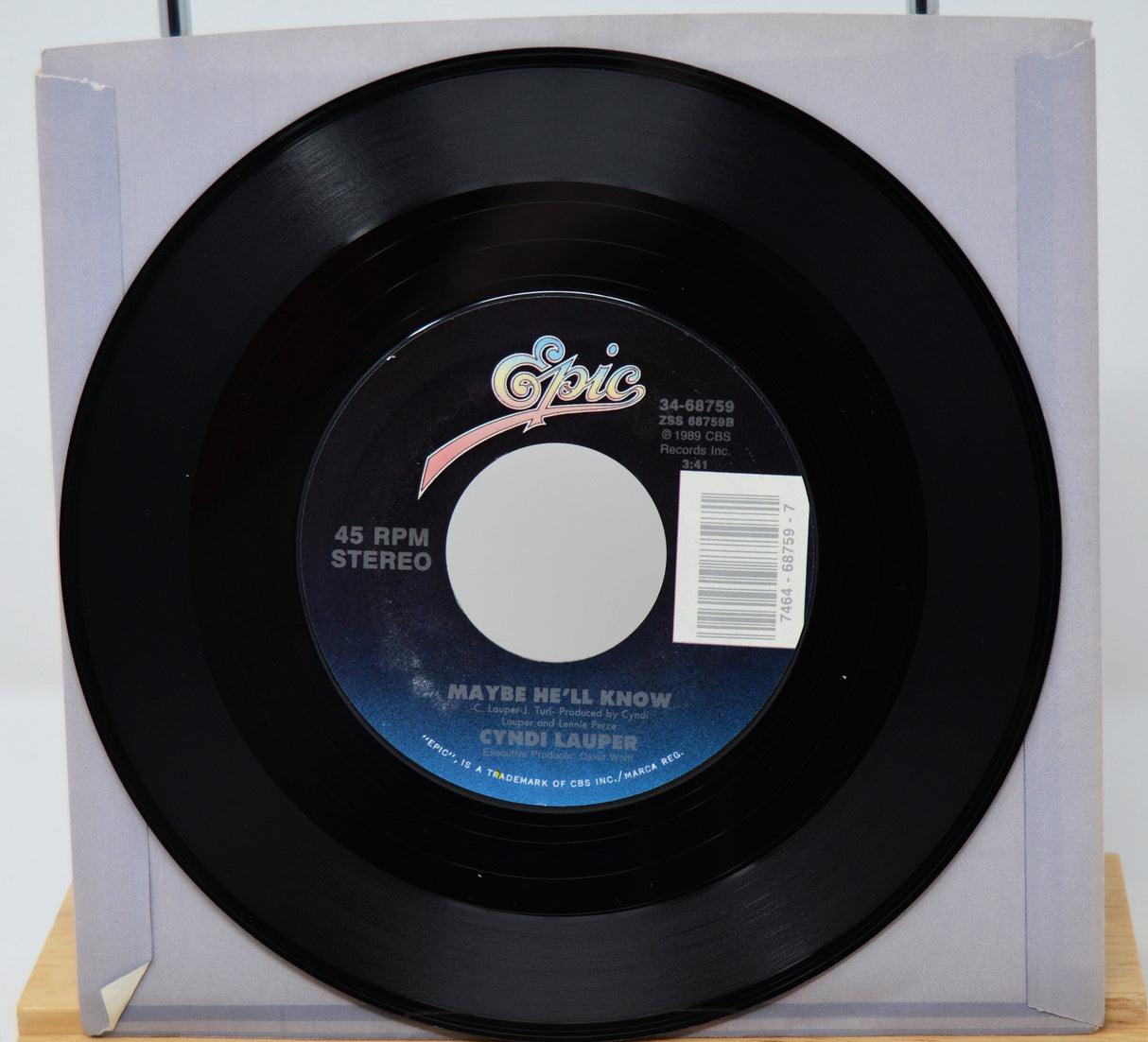 Vinyl record with 'Epic' label on a white background