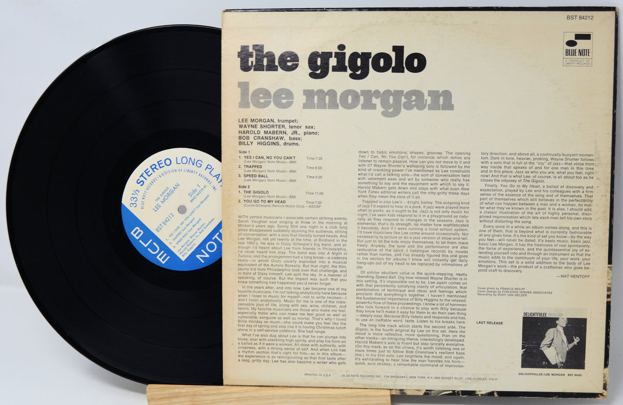 Vinyl record and cover with 'the gigolo' by Lee Morgan on a light gray background