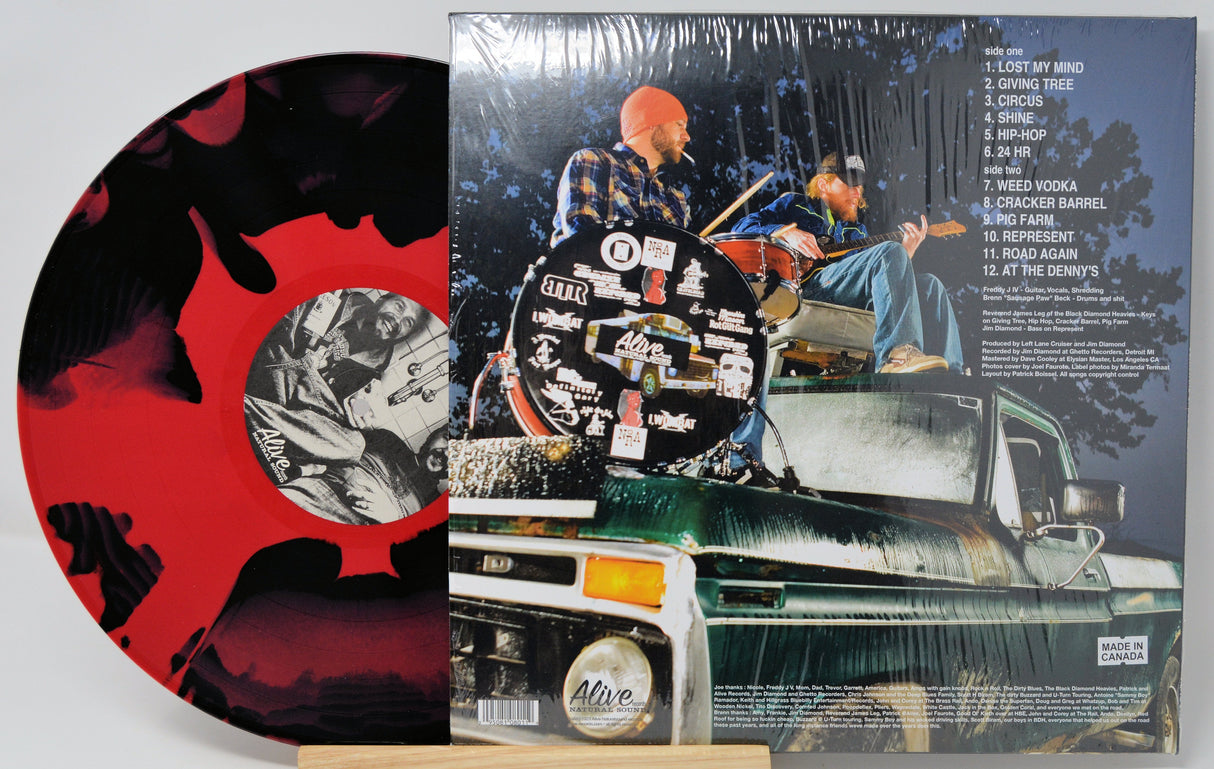 Back cover of Left Lane Cruiser's 'Junkyard Speed Ball' LP with tracklist and colored vinyl