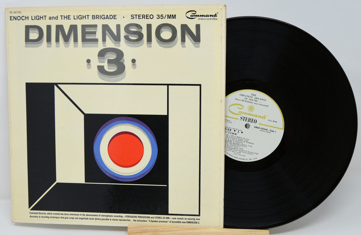 Vinyl record with cover featuring geometric design and text